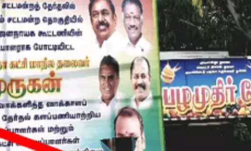 தாராபுரத்தில் நன்றி தெரிவித்து வைத்த  பேனரில் பாஜ.,தலைவர்  முருகன் படம் கிழிப்பு