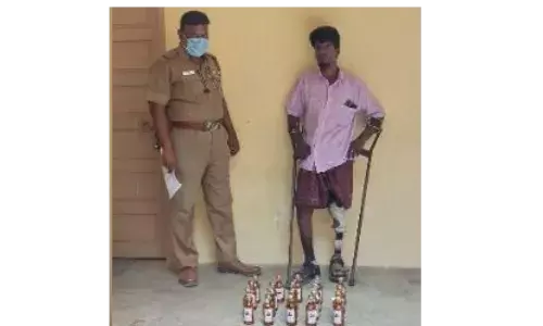 கலவையருகே மது பாட்டில் விற்றவர் கைது