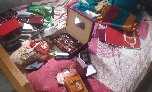 பாபநாசம் அருகே கோயில் அதிகாரி வீட்டில்  நகை, டிவி திருட்டு: போலீஸார் விசாரணை
