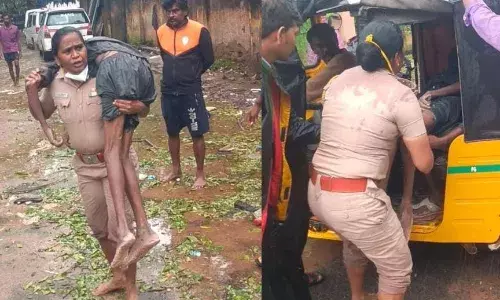 தோளில் சுமந்து இளைஞரை காப்பாற்றிய பெண் ஆய்வாளர்: குவியும் பாராட்டு
