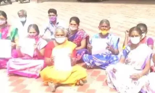 திருப்பூர் மாநகராட்சி அலுவலகம் முன்பு பொதுமக்கள் தர்ணா